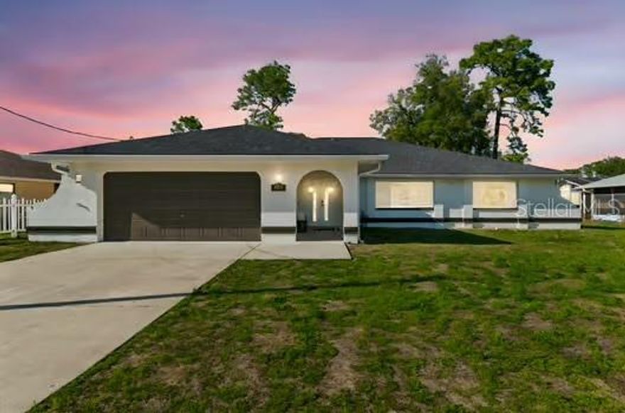 Welcome to your fully remodeled dream home in Spring Hill! Located at 9203 Lavina Lane, this stunning 3-bedroom, 2-bath pool home offers 2,149 sqft of beautifully updated living space with a modern open-concept design and high-end finishes throughout. From the moment you arrive, you’ll notice the attention to detail, stylish upgrades, and inviting curb appeal. Inside, the spacious chef-inspired kitchen features quartz countertops, stainless steel appliances, a massive waterfall island with seating, custom accent finishes, and an additional bar area complete with a wine fridge perfect for entertaining. The home also features oversized tile flooring, recessed lighting, custom walk-in closets, and brand-new finishes throughout.

Step outside to your private backyard oasis featuring an oversized screened-in pool area with luxury wood-accent detailing, multiple lounge and entertainment spaces, modern ceiling fans, and a resort-style feel that’s perfect for relaxing or hosting guests year-round. Sitting on a large lot with NO HOA, this property also includes a 2-car garage and plenty of outdoor space to enjoy.

Conveniently located near shopping, dining, schools, and major roads, this move-in-ready home is priced to sell under market value. Motivated seller — don’t miss this incredible opportunity!