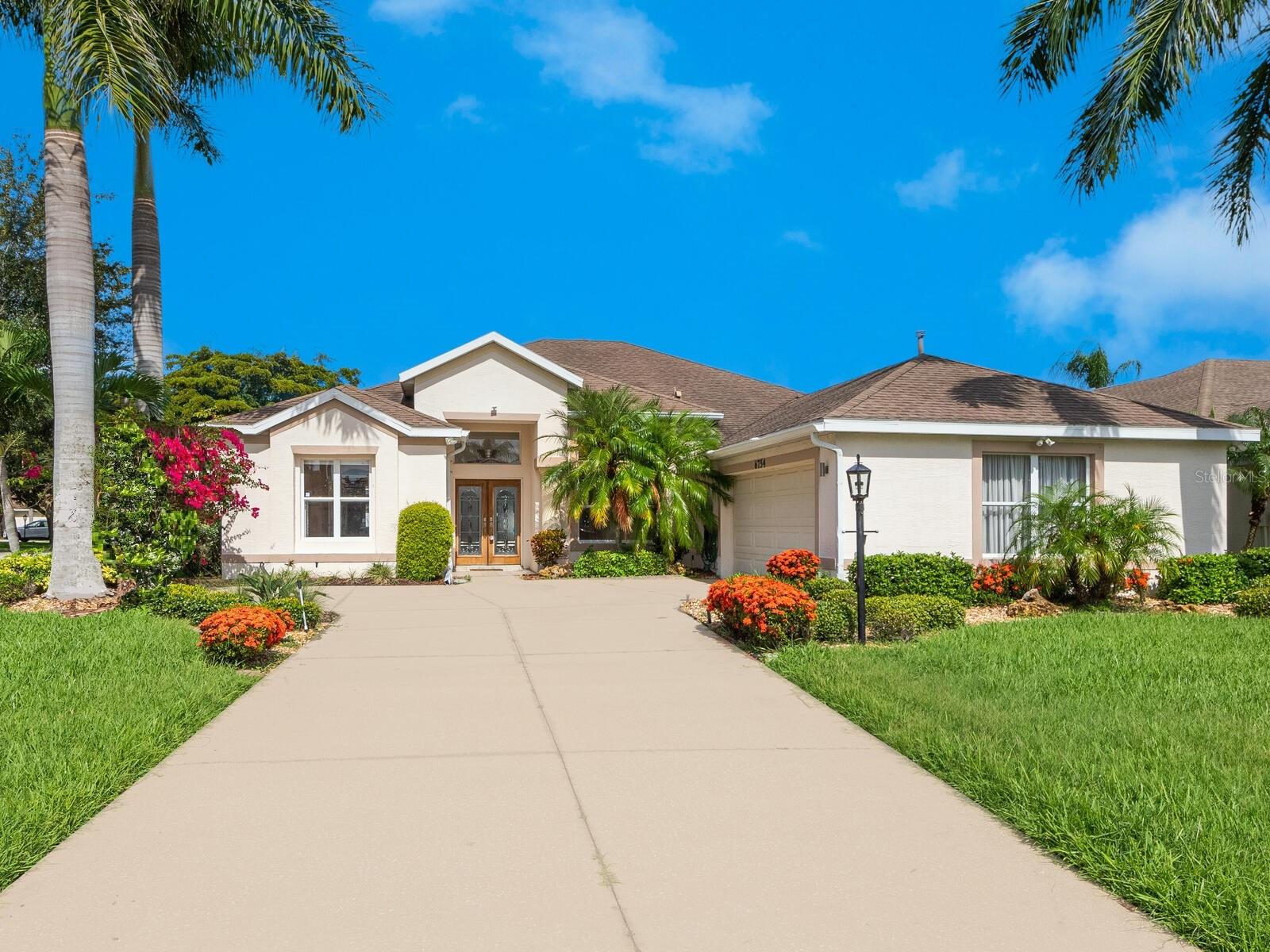 Absolutely beautiful single family home available to rent in the sought after community of Carlyle at Villages of Palm Aire. Located on a corner lot the home has three bedrooms, two bathrooms, spacious split floor plan, 12 foot ceilings, custom window shades, living room/dining room combination and great room off the kitchen. The kitchen has stainless appliances, gas stove with vent hood, closet pantry, stone counter tops, breakfast bar and breakfast nook. The primary bedroom has two closets and an en suite bathroom with double sinks, water closet, garden tub and a walk in shower. The guest bathroom has a tub/shower combination. A spacious screened lanai looking out to lush, landscaping and an oversized, side load 2 car garage rounds out the home. The property owner will allow one small dog with a non-refundable $500 pet fee. Community amenities include a pool, tennis and playground. Available ASAP for an annual rental. Call today as this will not last long.