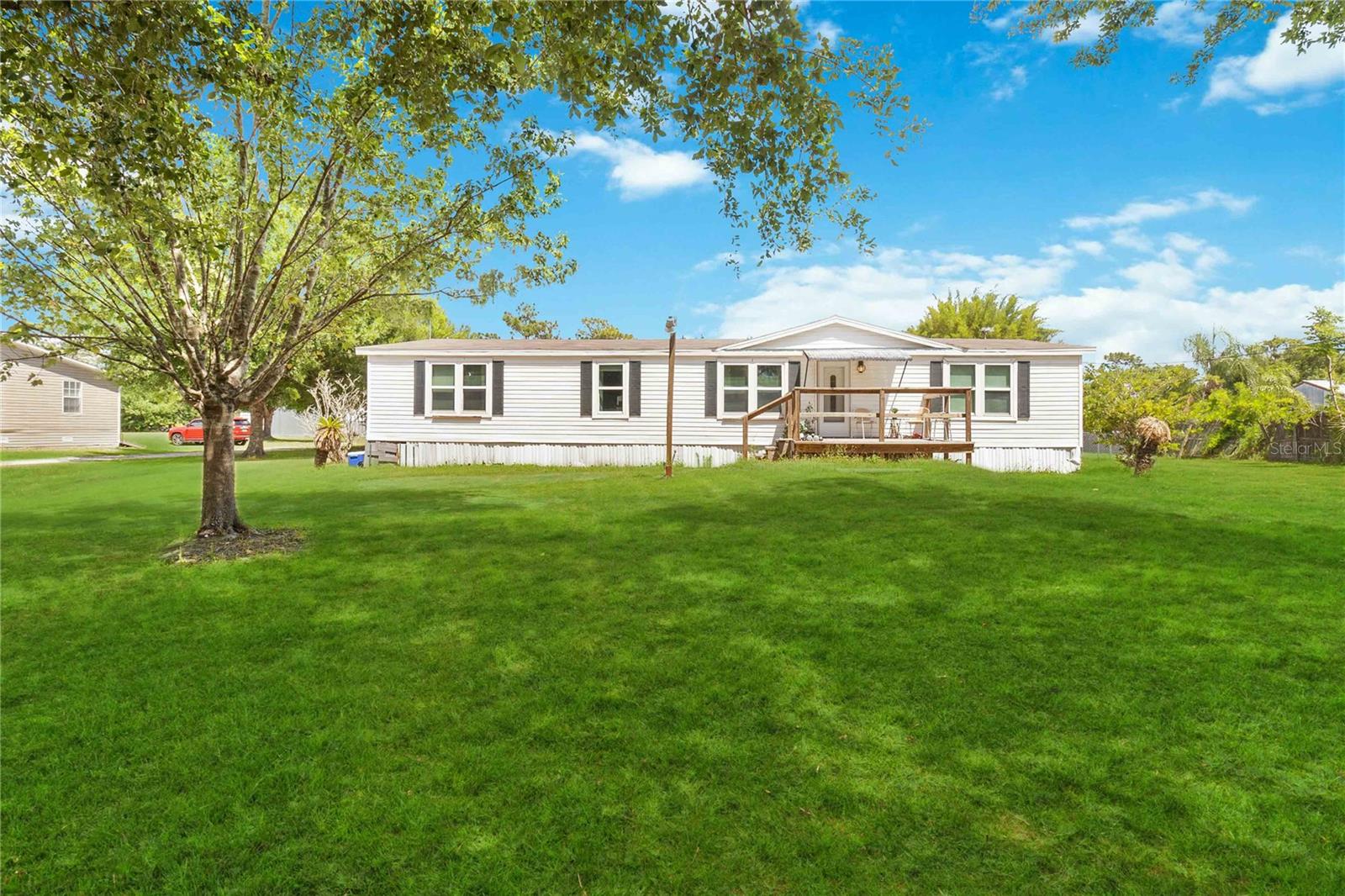 Welcome to this well-maintained, open floor plan home with 3-bedrooms, 2-baths located in Canaveral Acres, in beautiful St. Cloud. This home is located in a quiet country setting on just shy of 1 acre. If you're looking for more outdoor space, this home is perfect for backyard BBQ's, a garden, fruit trees, animals and no HOA! When the weather is cold, snuggle up to the fireplace with a cup of hot chocolate. This move-in ready home comes complete with all appliances, the well is 8 months new, water softener 3 years new and roof is 4 years new. Also a detached one car garage is included. If you're looking for country living, but close to St. Cloud, Melbourne Beach and just an hour away from the theme parks, then this home is for YOU! Make an appointment today to view this one-of-a-kind opportunity at a great price!
