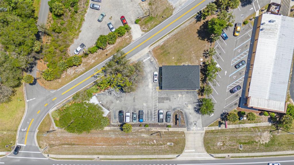 Photo of 2055 S Woodland Boulevard, Deland, FL 32720 (MLS # V4948561)