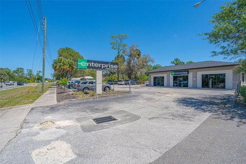 Photo of 2055 S Woodland Boulevard, Deland, FL 32720 (MLS # V4948561)