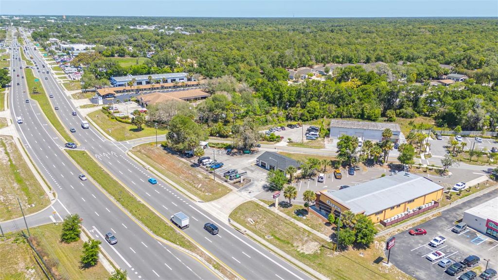 Photo of 2055 S Woodland Boulevard, Deland, FL 32720 (MLS # V4948561)