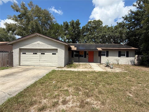 Photo of 3608 Tam Drive, Orlando, FL 32808 (MLS # O6436606)