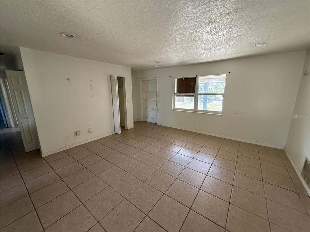 Photo of 3608 Tam Drive, Orlando, FL 32808 (MLS # O6436606)