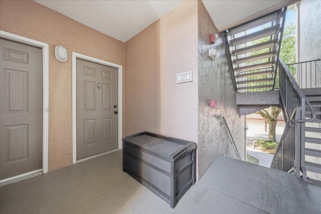 Photo of 6141 Metrowest Boulevard #207, Orlando, FL 32835 (MLS # O6396761)