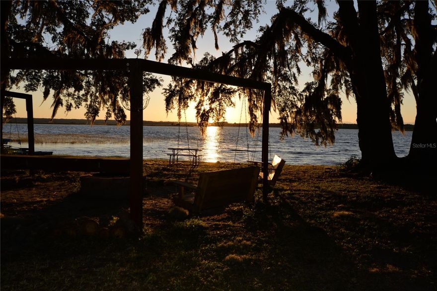 Experience tranquility and the melodies of nature at Salt Springs Elite RV Resort. This charming tiny home presents a cozy 1 bed/1 bath 1997 Chariot park model, meticulously renovated for your comfort. Low taxes and the 2023 mini-split-heat/AC keep your monthly bills low. Bask in the serene vista of Little Lake Kerr from the expansive fully screened porch, complete with sliding windows, ideal for hosting gatherings. Equipped for year-round relaxation and seasonal revelry, this retreat boasts all the amenities for your enjoyment. Dive into leisure with access to 2 heated pools, a soothing hot tub, and recreational activities such as pickleball, basketball, and horseshoes. Indoors, the lodge offers entertainment with pool tables and ample space for game nights. Fully furnished, this home is ready for immediate occupancy, catering to snowbirds seeking a winter haven or savvy investors exploring short-term rental opportunities. Offers may be submitted thru March 31, 2026 @ 2 pm. AT SELLER'S DISCRETION A SUBMISSION MAY BE ACCEPTED AT ANY TIME.