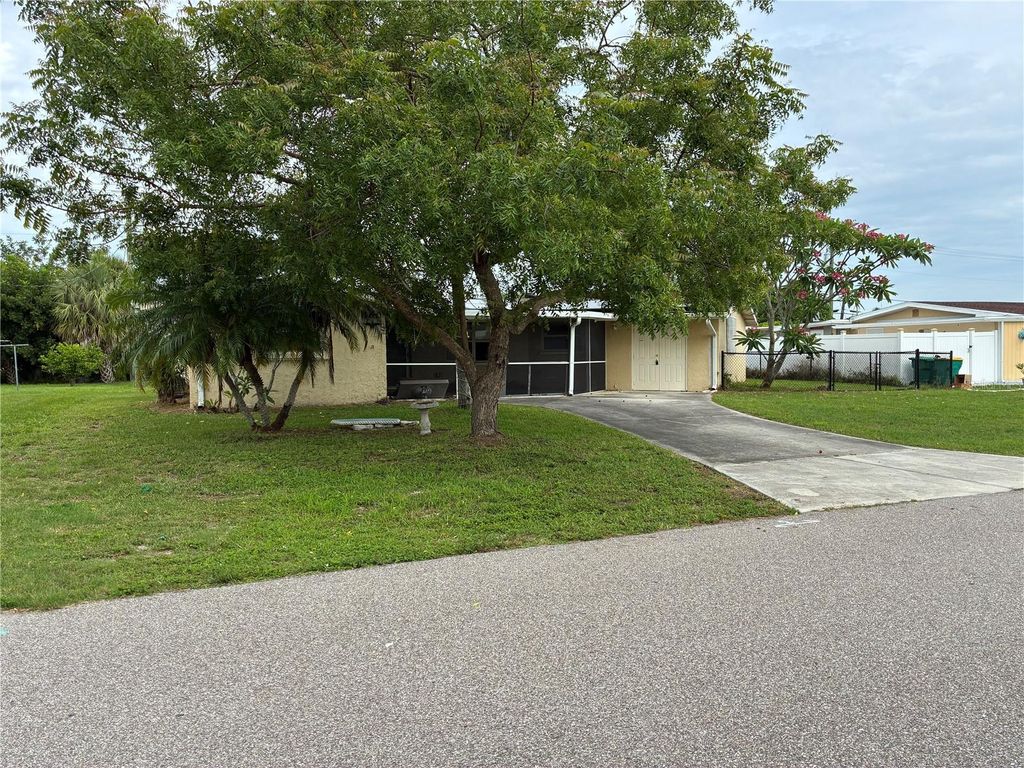 Photo of 160 Deerfield Avenue NE, Port Charlotte, FL 33952 (MLS # C7526808)