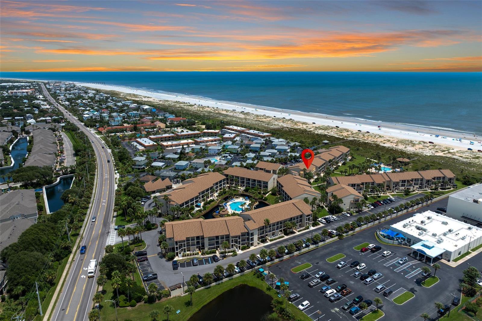 Make sure to check out the Virtual Tour for a 3D Model w/ Walkthrough, Floor Plan w/ Measurements, Video, & more! Looking for your permanent salt life staycation on the beach of St Augustine? Unit 43 in Ocean Villas on Anastasia Island is the coastal escape you’ve been dreaming of! Located on the first floor of the sought-after gated Ocean Villas complex, this 3-bedroom, 2-bath condo delivers 1,300 square feet of light-filled living space with a view of the sparkling pool right from your HUGE private back patio! This beachside beauty checks the boxes for owners and short-term rental seekers alike (yes, Airbnb is allowed, and $300+/night is realistic here). The association covers exterior/grounds maintenance, sewer, trash, and water... keeping things simple while you soak up the good life! Before you even step inside, a private courtyard-style entrance welcomes you with a glass-enclosed sunroom perfect for morning coffee or sandy flip-flops. Need storage space? You have a separate storage room for your beach gear, bikes, or boogie boards. It's a rare double-entry setup that gives you extra space and privacy! Inside, the open-concept design blends the living and dining areas, making it easy to entertain or unwind after a day in the sun. The kitchen features granite counters, ample cabinetry, and a pass-through window with a breakfast bar that keeps the space connected and social. The master suite includes an en-suite bath and sliding glass doors that open to the back patio, perfect for catching the morning sunshine or ocean breezes at night! The two guest bedrooms and guest bathroom are have plenty of space for family, friends, and guests! Ocean Villas is an oceanfront community with two resort-style pools, one heated in the winter, the other beachside with a walk-in entry plus a charming gazebo for shaded relaxing after a long day of… relaxing! Private beach access makes it easy to live like you're on vacation, and with free resident and guest parking, you can invite the whole crew. Perfectly positioned within St. Augustine Beach’s coveted “golden mile,” you’re minutes from locally loved restaurants, shops, and just 15 minutes from historic downtown. Whether you’re buying for personal use, income potential, or a bit of both... Unit 43 in Ocean Villas delivers location, coastal living, and laid-back luxury all in one! Don't sleep on this one! ...well... unless it's in a hammock on the back patio listening to the sounds of the ocean!