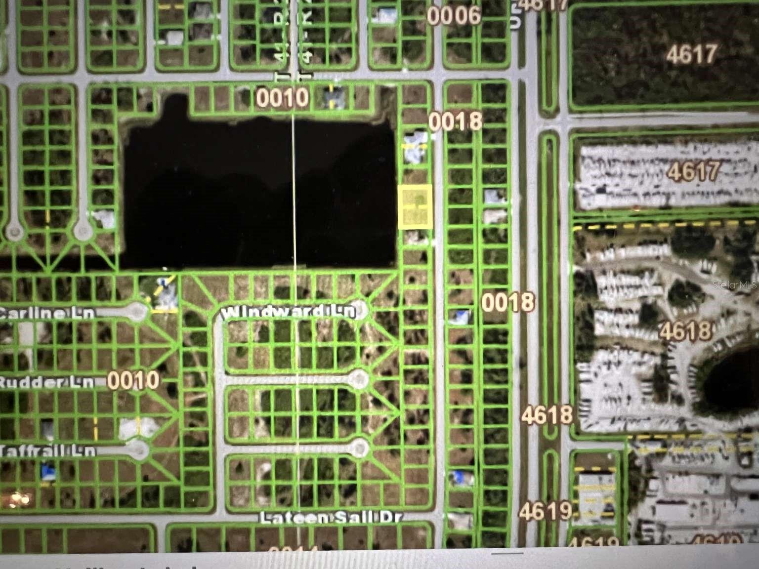 Double lot (0.37 acre) westerly sunset view on the one of the largest lakes in the community. Located in Rotunda Sands, 4.4miles to the Boca Grande Causeway, 4.1 miles to Publix grocery store.