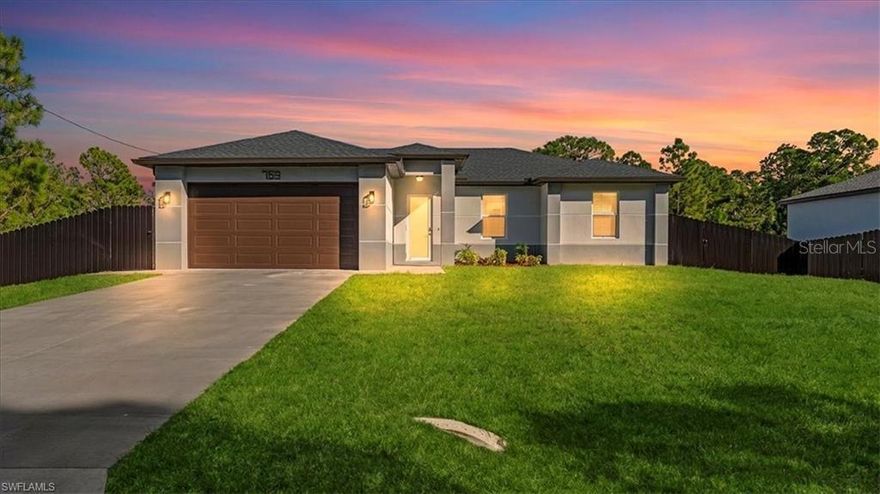 Welcome home to this stunning New Construction 3-bedroom, 2-bathroom residence in a flourishing area of Lehigh Acres. The open-concept design creates a bright and airy atmosphere, centered around a flawless kitchen that boasts elegant wood cabinets, sleek quartz countertops, and a full suite of brand-new stainless steel appliances. Safety and serenity are ensured with impact windows and doors installed throughout. The home also features a fully fenced backyard, offering added privacy and a safe, dedicated outdoor living space. Every corner radiates modern style with gorgeous porcelain tile underfoot. This move-in-ready property requires zero updates, offering the perfect, low-maintenance sanctuary. Call now for a private showing!