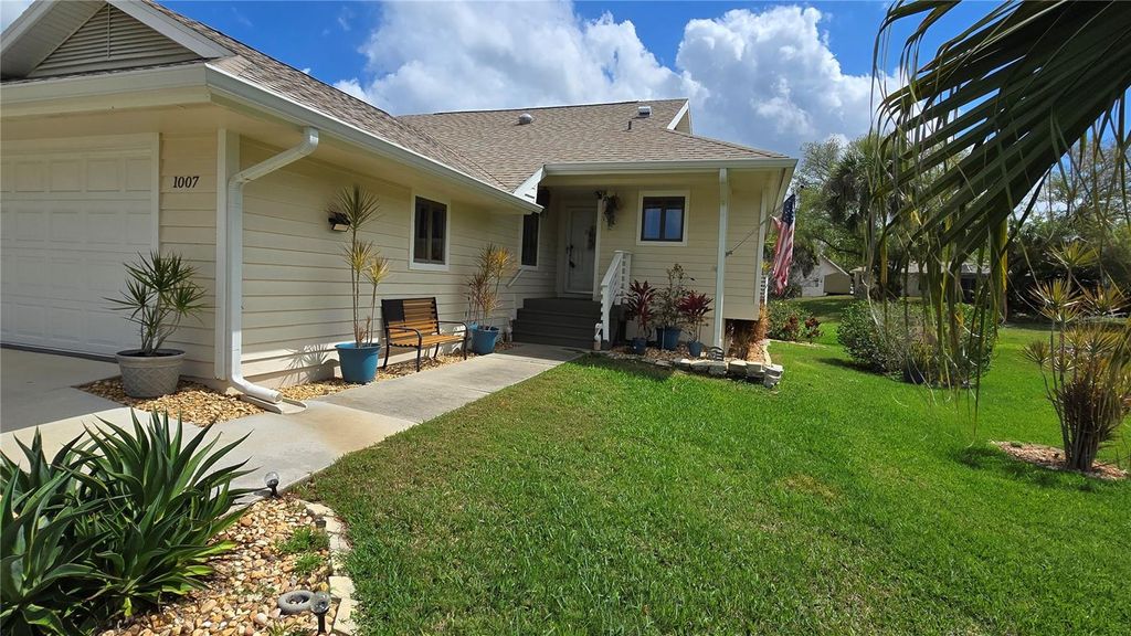 Photo of 1007 Lake Avoca Drive, Tarpon Springs, FL 34689 (MLS # TB8463440)