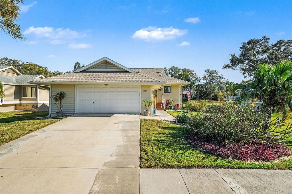 Photo of 1007 Lake Avoca Drive, Tarpon Springs, FL 34689 (MLS # TB8463440)