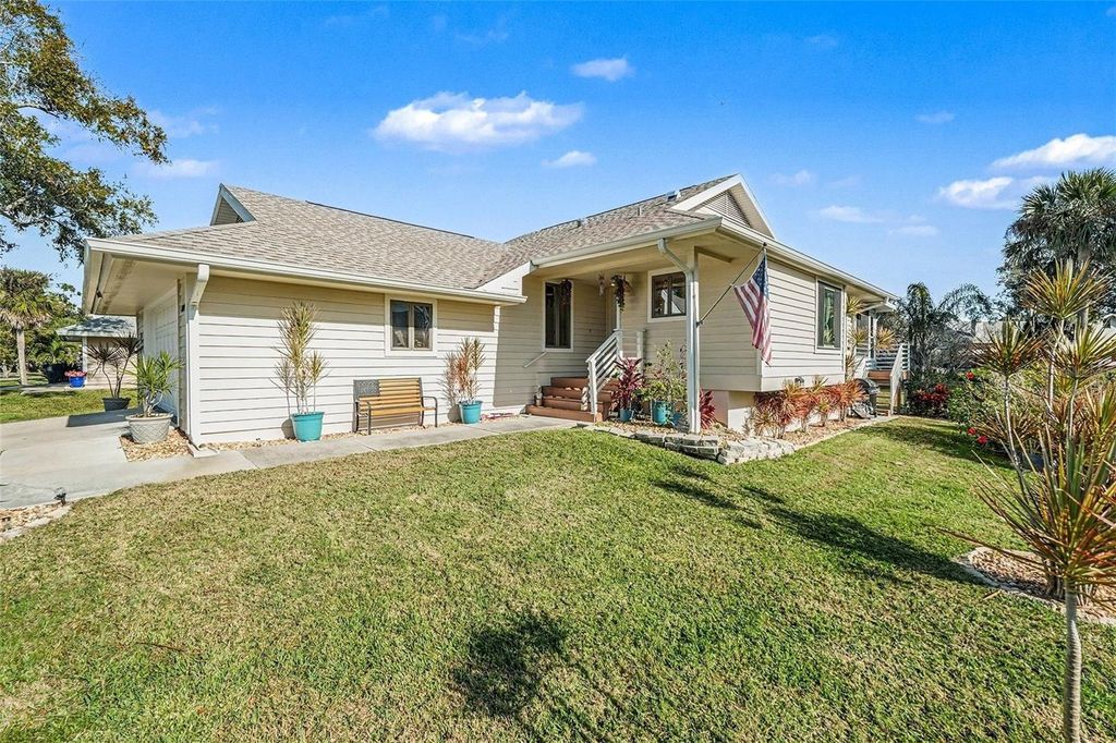 Photo of 1007 Lake Avoca Drive, Tarpon Springs, FL 34689 (MLS # TB8463440)