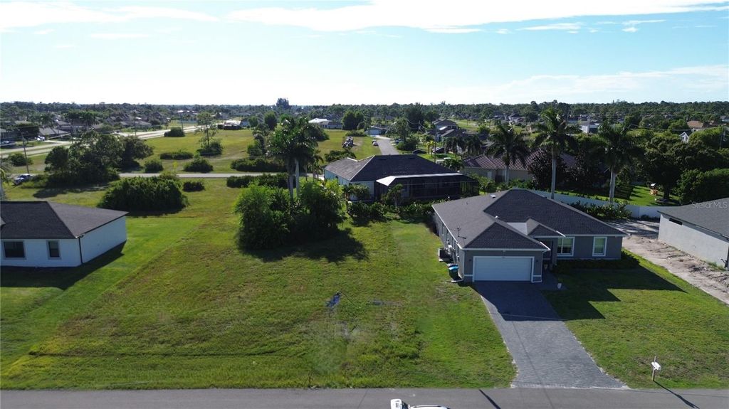 Photo of 2012 NW 24th Place, Cape Coral, FL 33993 (MLS # TB8434138)