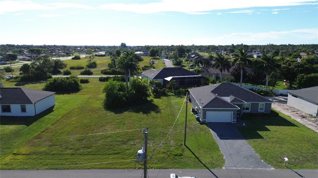 Photo of 2012 NW 24th Place, Cape Coral, FL 33993 (MLS # TB8434138)