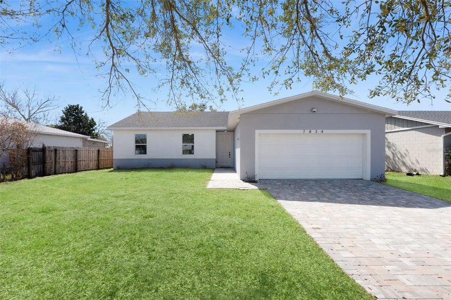 One or more photo(s) has been virtually staged. Rare opportunity to own a brand new home with NO HOA in an established Orlando neighborhood.

This beautifully built 4 bedroom, 2 bath home offers the perfect combination of modern design, quality craftsmanship, and everyday comfort. From the moment you walk in, you'll appreciate the bright, open layout, abundant natural light, and thoughtfully selected finishes throughout.

The heart of the home is the stunning kitchen, featuring quartz countertops, ceiling-height shaker cabinetry, brand new stainless steel appliances, and a large center island that seamlessly connects to the living and dining areas making it perfect for entertaining or simply enjoying everyday life.

The split-bedroom floor plan provides privacy for the spacious primary suite, while the additional bedrooms offer flexibility for family, guests, a home office, or a growing family. Every detail has been carefully considered to create a home that is both stylish and functional.

Outside, you'll find a paver driveway, two-car garage, and a spacious backyard with plenty of room to relax, play, or create your own outdoor oasis.

Why buy an older home and worry about costly updates when you can enjoy the peace of mind that comes with brand-new construction? Conveniently located near Orlando International Airport, Downtown Orlando, Lake Nona, Valencia College, UCF, major highways, shopping, dining, and entertainment, this home offers easy access to everything Central Florida has to offer.

Move-in ready, beautifully finished, and built for today's lifestyle this is one you won't want to miss.