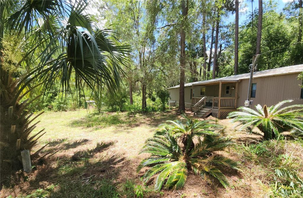 Photo of 22835 SW 117th Place Road, Dunnellon, FL 34431 (MLS # OM725797)