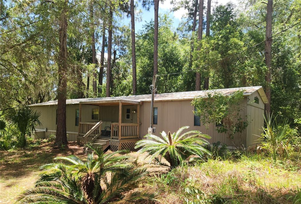 Photo of 22835 SW 117th Place Road, Dunnellon, FL 34431 (MLS # OM725797)