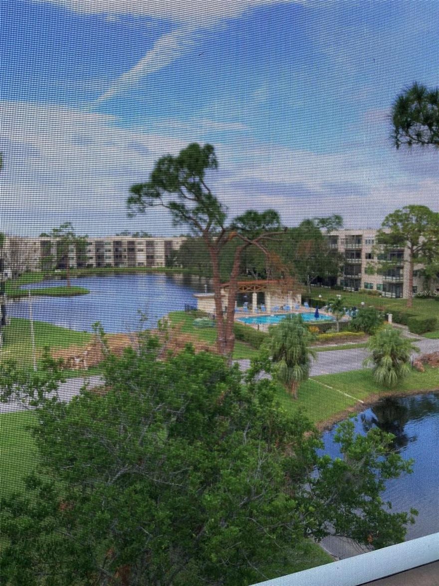 Welcome to this top floor corner unit in the 55+ Five Towns Lexington Building. It is a two bedroom two bath unit with a carport parking spot. This unit is updated and fully furnished in a peaceful setting with a pond view and a short walk to one of the two clubhouse/fitness centers. The Master suite has extra windows and lots of natural light. The second bedroom is set up as an office. The screened balcony overlooks the pond and is a peaceful retreat, located just off the kitchen. The Landlord will remove any furnishings you do not want. The community includes six pools and two clubhouses where all the many clubs that Five Towns offers meet to enjoy time with neighbors. The only utility you pay is electric, everything else is included in the rent even TV and internet. It is located with easy access to shops, restaurants, and medical services and a short drive to the beach, downtown St. Petersburg and I-275  Come take a look, this is a great opportunity to see if Five Towns is your forever home. Give it a try and join this vibrant community.