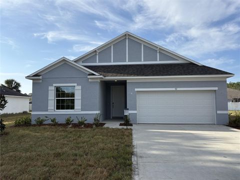 Photo of 92 Pine Grove Drive, Palm Coast, FL 32164 (MLS # O6335075)