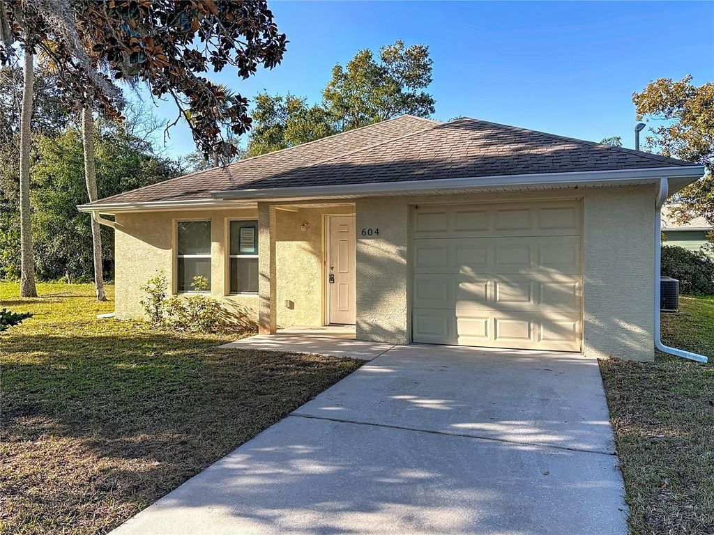 Photo of 604 N Duss Street, New Smyrna Beach, FL 32168 (MLS # O6371480)