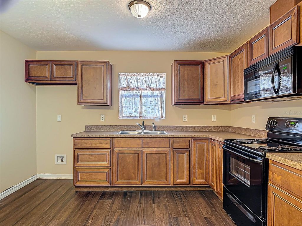 Photo of 604 N Duss Street, New Smyrna Beach, FL 32168 (MLS # O6371480)