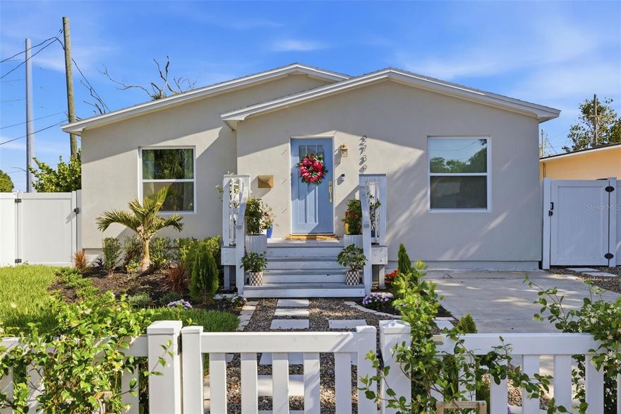 Welcome to your picture-perfect spring cottage - where charm, comfort, and thoughtful upgrades come together beautifully. From the moment you arrive, you’ll fall in love with the inviting curb appeal. A classic white picket fence, gracefully lined with fragrant star jasmine, frames the home, while fresh landscaping and an irrigation system keep everything lush and vibrant year-round. Inside, this 2-bedroom, 2-bathroom home feels anything but modest. The open-concept living space is airy and impressive, featuring vaulted ceilings that create a grand yet cozy atmosphere - perfect for both relaxing and entertaining. The kitchen has been beautifully updated with modern finishes, offering both style and functionality for everyday living. The primary suite is enhanced with a custom closet system by California Closets, providing exceptional organization and storage. Step outside to your private backyard oasis. A spacious deck invites you to unwind or host gatherings, while the firepit area sets the scene for cozy evenings under the stars. The yard is fully fenced and thoughtfully landscaped, complete with a storage shed for added convenience. Located outside of a flood zone and just 10 minutes from downtown St. Petersburg, this home offers peace of mind along with easy access to dining, shopping, and vibrant city life. This charming cottage truly has it all - character, upgrades, and an unbeatable location. Up to $5,300 towards closing costs with our preferred lender!