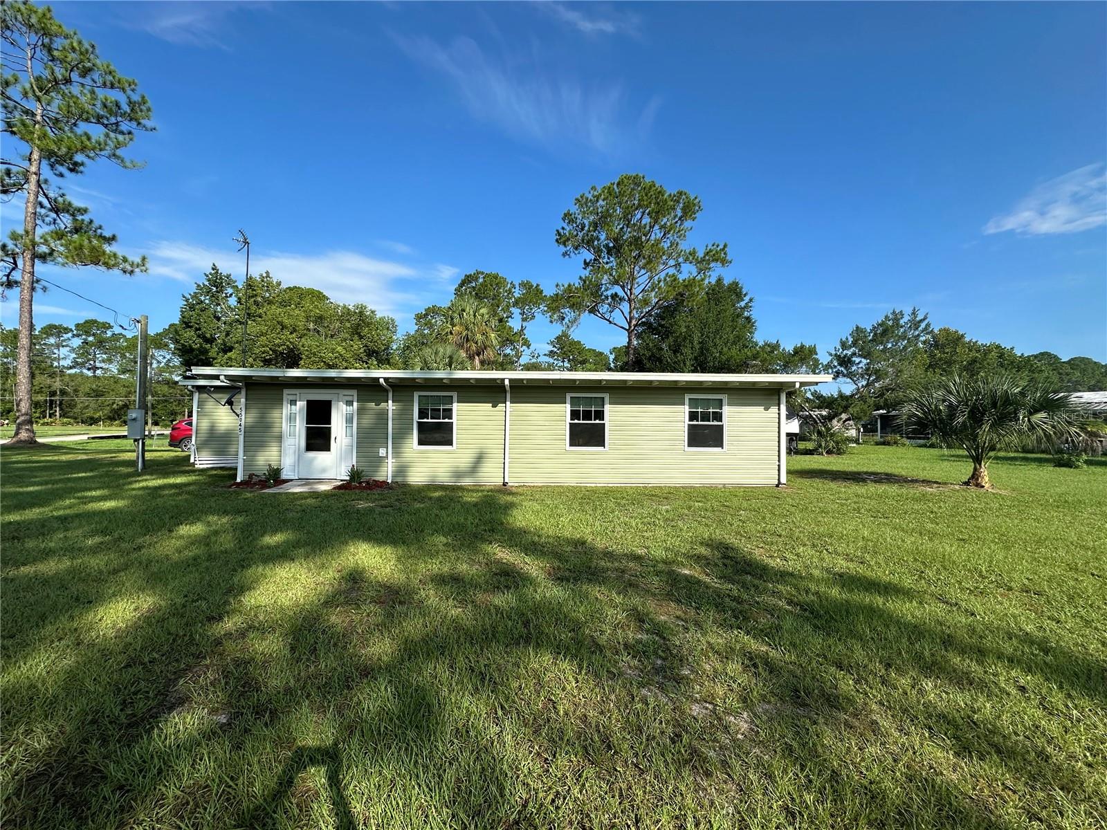 TURN-KEY READY AND FULLY FURNISHED- JUST BRING YOUR TOOTH BRUSH!
THIS BEAUTIFULLY UPDATED AND FULLY FURNISHED 3-BEDROOM, 2-BATHROOM MOBILE HOME, FEATURING A BRAND-NEW HVAC UNIT INSTALLED IN JANUARY 2025 WITH A TRANSFERABLE WARRANTY, A DURABLE METAL ROOF, AND ALL DRYWALL INTERIOR WITH STYLISH TILE AND LAMINATE FLOORING. YOU'LL LOVE THE SPACIOUS KITCHEN, OVERSIZED LIVING ROOM, AND LARGE SCREENED-IN PORCH-PERFECT FOR ENTERTAINING! THE PROPERTY ALSO INCLUDES A LARGE SHED FOR TOOLS AND EQUIPMENT A RV HOOK UP. SITS ON AN OVERSIZED CORNER LOT WITH PLENTY OF ROOM FOR A BOAT! CLOSE TO ASTOR BOAT RAMP!