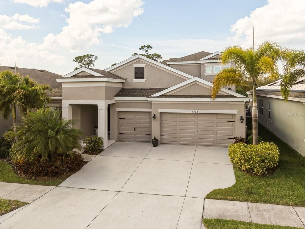 Photo of 6502 Maiden Sea Drive, Apollo Beach, FL 33572 (MLS # TB8469049)