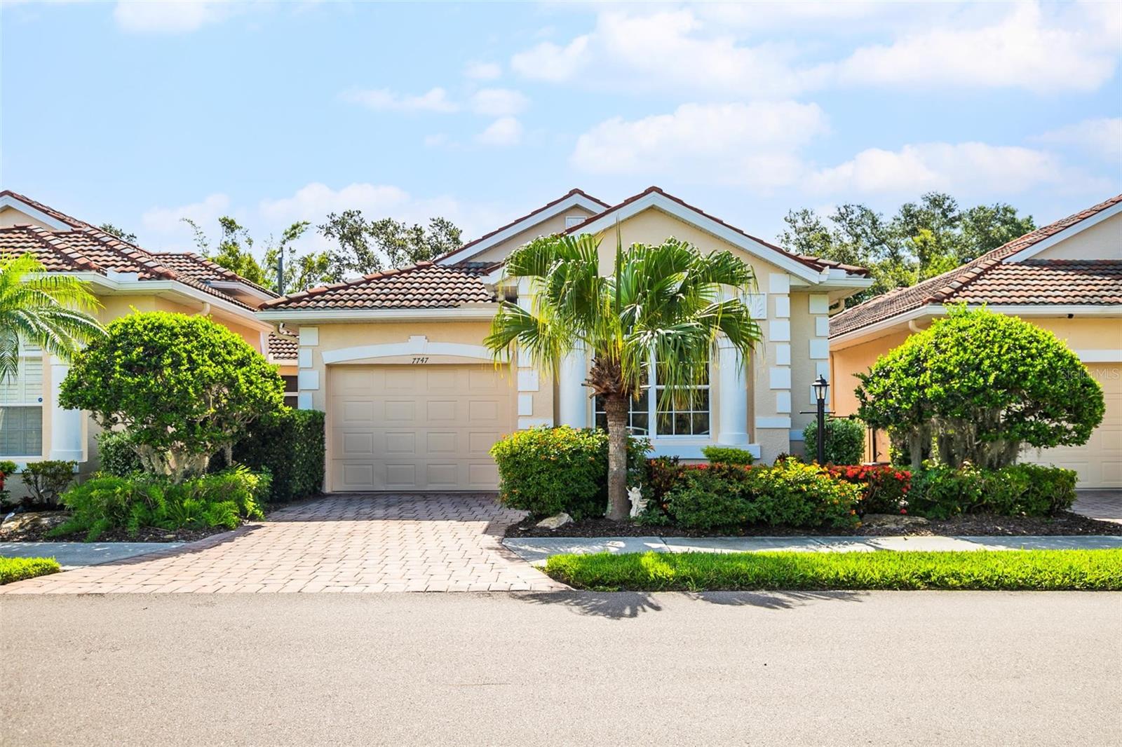 Discover the perfect blend of style and function in this 2-bedroom, 2-bath home located in the gated enclave of Palm Lakes in Sarasota. With 1,464 square feet of living space, this home offers an open and welcoming layout ideal for both relaxation and everyday living. The home has a private gated courtyard entrance leading to a screened lanai for a perfect blend of outdoor and indoor space. The spacious primary suite includes room for a sitting area or home office. The home features a 1-car garage and tile roof for added convenience and curb appeal. The updated kitchen includes quartz countertops, a stylish tile backsplash, breakfast bar, and direct access to the main living area — ideal for entertaining. Additional features include a full laundry room and a private, screened lanai perfect for enjoying Florida’s year-round sunshine in peace and comfort. Brand new air conditioning unit just installed! Tucked just north of University Parkway, Palm Lakes is a hidden gem of a neighborhood with only 114 single-family homes. This gated community is known for its charming curb appeal—think paver driveways, barrel tile roofs, and lush, mature landscaping. The HOA fees are refreshingly reasonable and cover lawn care, pest control, the gated entry, and use of the amenities. Residents enjoy a heated community pool, clubhouse with a pool table, and a playground with fun extras like cornhole for the grown-ups. Just a short stroll away, a brand-new county park features pickleball courts, walking paths, and a dog park—perfect for staying active and connected. Enjoy close proximity to Sarasota’s top attractions, including I-75, Sarasota Airport, St. Armands Circle, Lido Key, downtown Sarasota, Lakewood Ranch, and the upscale dining and retail at UTC Mall. Palm Lakes offers a tranquil setting without sacrificing access to everything this vibrant area has to offer. If you're looking for a home that makes everyday living feel like a getaway, come see this one before it's gone!