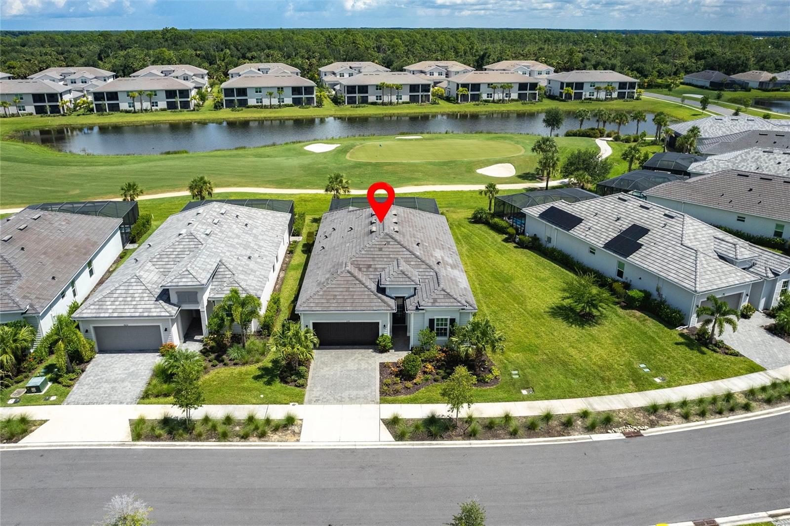 GOLF BUNDLED – Resort-Style Living at Its Finest! Experience the best of Southwest Florida living in this beautiful golf course pool home with bundled golf, located in the highly desirable Babcock National community. This highly sought after Calusa Model residence offers over 2,200 square feet of modern elegance with 3 bedrooms + Flex, 3 bathrooms and a fabulous pool/spa with a fully equipped outdoor kitchen, creating the perfect blend of indoor comfort and resort-style living. From the moment you arrive, the home impresses with its curb appeal, featuring a brick paver driveway/walkway, a two-car garage, and lush tropical landscaping that frames the inviting entryway. Inside, a welcoming foyer opens to the spacious living and dining areas, highlighted by tray ceilings, wood plank tile flooring, and sliding glass doors that extend the living space outdoors. The open-concept design creates a seamless flow, ideal for both everyday living and entertaining. At the heart of the home, the gourmet kitchen showcases an expansive granite island with seating, crisp white shaker cabinetry with crown molding, under-cabinet lighting, a subway tile backsplash, and top-of-the-line stainless steel appliances including a gas cooktop with vent hood, built-in oven and microwave, and a walk-in pantry. Designed to be both stylish and functional, this space opens directly to the main living areas for effortless entertaining. A dedicated laundry room with storage and sink adds everyday convenience. The primary suite is a private retreat with direct access to the pool and lanai. It features two closets, including a spacious walk-in, and an en suite bath with dual granite vanities and a large walk-in shower enclosed in sleek glass doors. Two guest bedrooms provide comfort and flexibility—one featuring its own private en suite bath, while the other shares a full bath with the versatile flex room, which is enhanced by French doors that make it ideal as a home office or den. Outdoor living is truly exceptional, with unobstructed golf course views as the backdrop to a screened-in, heated pool and spa set on an elegant brick paver patio. A covered dining area and sun deck provide the perfect spots for alfresco meals or lounging by the water. The fully equipped outdoor kitchen is ideal for hosting gatherings, complete with a built-in stainless steel gas grill, smoker, refrigerator, vented hood, and stone-accented wall. Whether entertaining friends or enjoying peaceful evenings at home, this space embodies the Florida lifestyle. Babcock National offers an unmatched array of amenities, including a brand-new clubhouse, resort-style pool with tiki bar, tennis, pickleball and bocce courts, a full-service spa and modern fitness center, on-site dining at two restaurants, a full calendar of social events, and 24/7 gated security with roving patrols. This home combines refined elegance, modern comfort, and unparalleled community amenities. With its ideal location, luxury upgrades, and competitive price, it presents an outstanding opportunity in one of the area’s most sought-after golf communities.
**PLEASE ENJOY THE 3D INTERACTIVE VIRTUAL TOUR ASSOCIATED WITH THIS LISTING**
