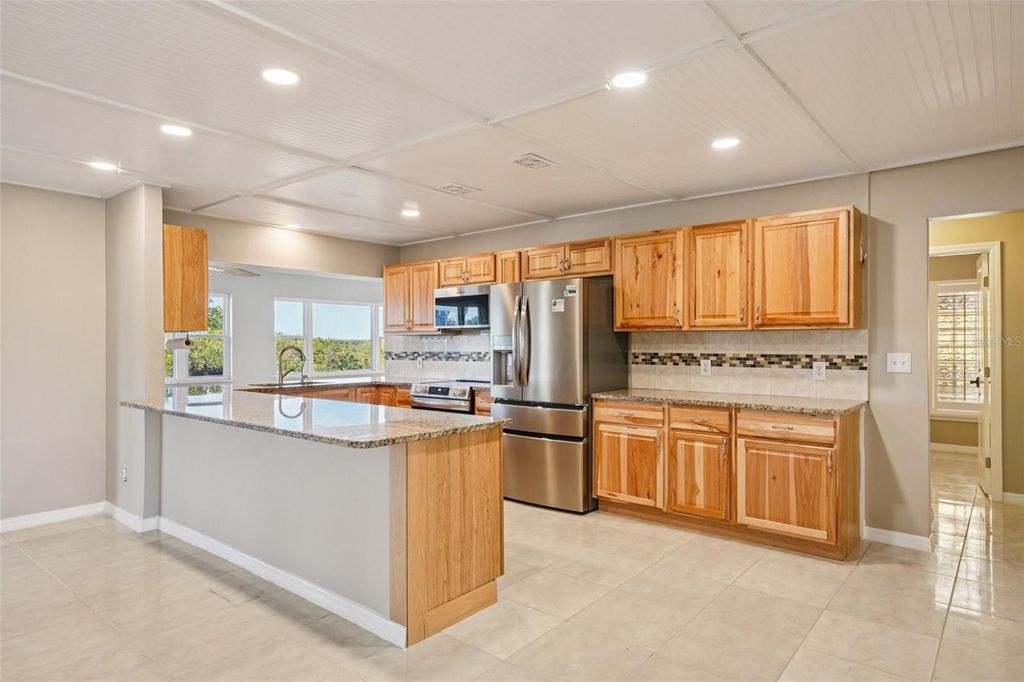 Photo of 9909 San Diego Way, Port Richey, FL 34668 (MLS # TB8451159)