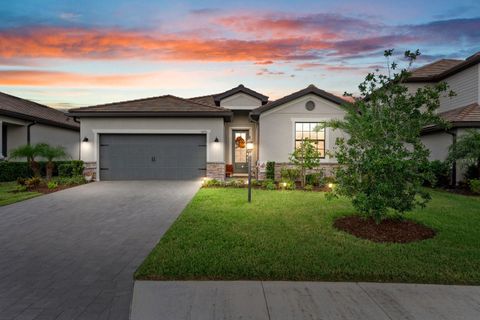 Photo of 15711 Barefoot Beach Drive, Bradenton, FL 34211 (MLS # A4665195)