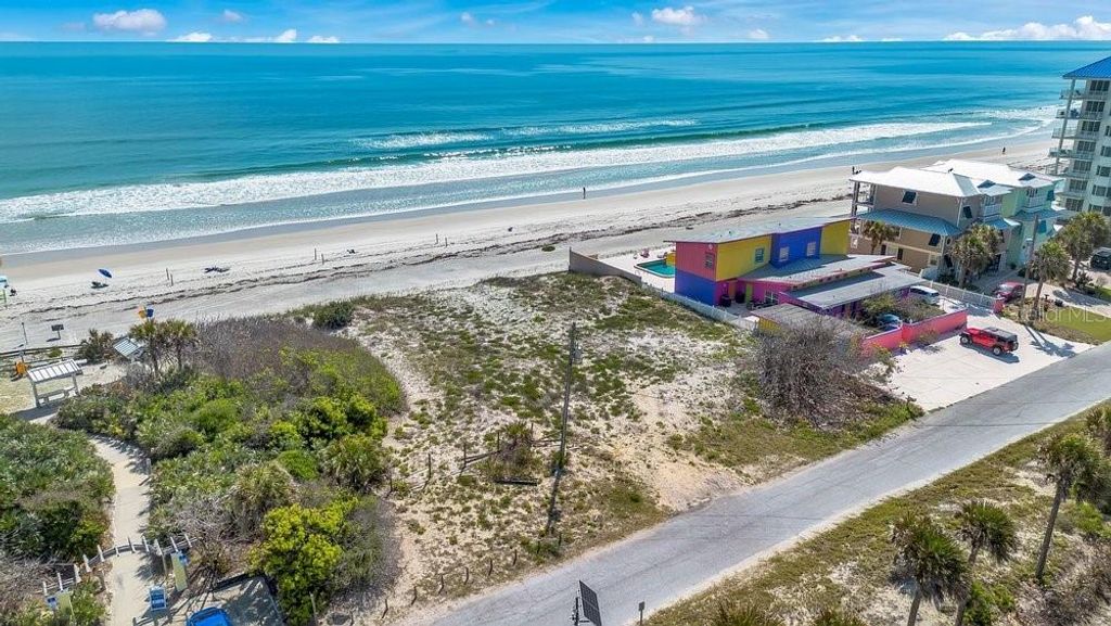 Photo of 4591 S Atlantic Avenue, Port Orange, FL 32127 (MLS # O6404939)