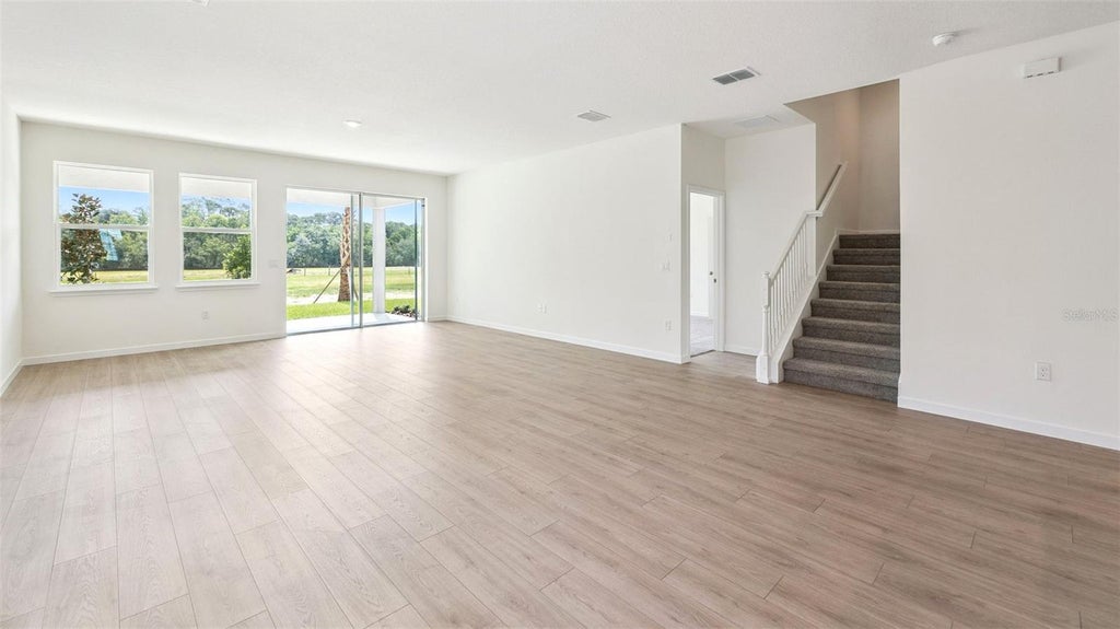 Photo of 3038 Kingsman Trail, Ormond Beach, FL 32174 (MLS # O6438181)