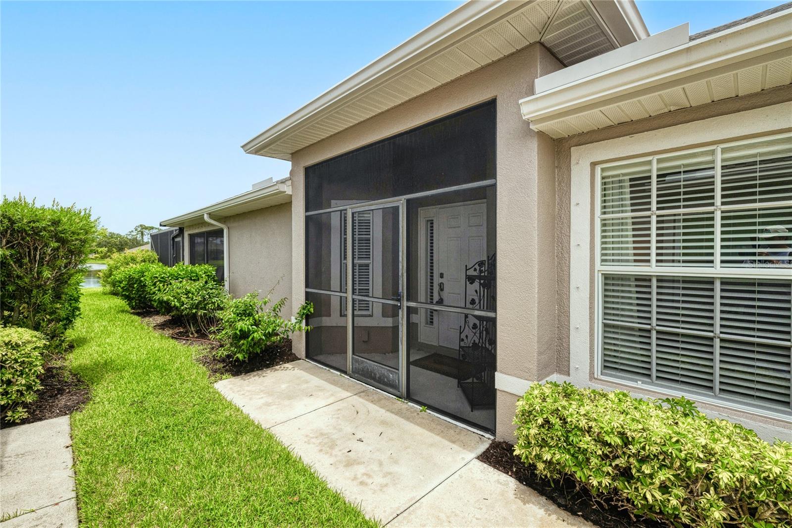 NORTH PORT – SABAL TRACE. Welcome to this beautifully maintained 3-bedroom, 2-bath home located in the heart of North Port. Nestled in a peaceful neighborhood, this residence offers comfortable Florida living with a tranquil LAKE VIEW as your daily backdrop.
Step inside to discover a SPACIOUS, BRIGHT AND AIRY, OPEN FLOOR PLAN, perfect for both relaxing and entertaining. Inside you will also find the home painted in cheery Florida colors that surely adds to the Florida living style! The well-appointed kitchen with all stainless-steel appliances and ample cabinetry as well as a convenient layout that flows effortlessly into the dining and living spaces. All floors are luxury vinyl or tile for easy cleaning (NO RUGS!).
The spacious PRIMARY SUITE includes a WALK-IN CLOSET and an EN-SUITE BATHROOM for added privacy and consists of a DOUBLE SINK VANITY and WALK-IN TILED SHOWER, while two additional bedrooms offer flexibility for guests, a home office, or hobbies. The laundry room is complete with a newer washer and dryer and has an additional utility/storage closet too!
One of the highlights of this home is the EXTENDED LARGE SCREENED LANAI, ideal for enjoying your morning coffee or evening sunsets overlooking the serene pond. The attached 2-car garage offers plenty of storage and parking space.
MAJOR UPDATES INCLUDE: A NEW ROOF IN 2022, OUTSIDE HOUSE PAINTED 2024, NEW AC IN 2021, NEW WATER HEATER IN 2020. Other updates include: New Fridge in 2018, New Garbage Disposal in 2020, New Washer 2021, New Dryer 2024, New Dishwasher 2024, New Microwave 2025, New Kitchen Faucet 2018, New Garage door opener and motor 2024.
Sabal Trace is a GATED COMMUNITY for added privacy and security and offers maintenance-friendly lifestyle. You will certainly enjoy the heated community pool, club house, sidewalks and walking paths in this serene setting. Located just minutes from shopping, dining, and parks, this home combines comfort, convenience, and a peaceful setting—making it an excellent choice for year-round living or a seasonal retreat.