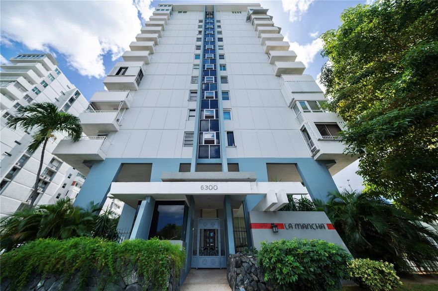 Located on a high floor within Condominio La Mancha in Isla Verde, this corner unit offers an elevated living experience with open views of the lagoon and partial ocean exposure. Positioned on the 11th floor, the apartment benefits from enhanced natural light, cross ventilation, and a more private setting compared to interior units. The residence features a functional layout with 2 bedrooms and 1 full bathroom, complemented by a well-defined living and dining area that connects seamlessly with a fully equipped kitchen. The primary bedroom includes a walk-in closet, adding both convenience and storage. With approximately 987 square feet, the unit provides a comfortable and efficient living space ideal for long-term tenants seeking a well-located property in one of Puerto Rico’s most sought-after coastal communities. Residents of Condominio La Mancha enjoy amenities such as 24/7 security, a fitness center, swimming pool, and on-site coin laundry facilities. Isla Verde is known for its accessibility, proximity to the airport, beaches, restaurants, and entertainment options, making it a prime residential and lifestyle destination. Available for a one-year lease at $2,000 per month.