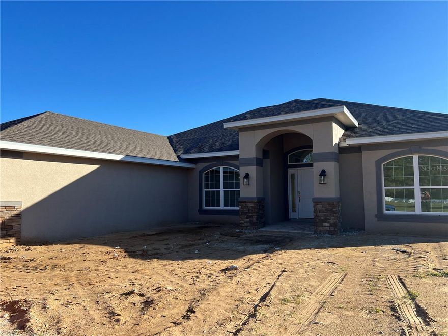 Why wait to build? This brand-new 2330 sq ft Adams Homes estate home offers 4 bedrooms, 2 bathrooms, a living room, and a separate family room on a full one-acre homesite in Hill Country Estates. Step inside to an open, spacious layout with ceramic tile in main areas, plush carpeted bedrooms, vaulted ceilings, and beautiful backyard views. The modern kitchen features snow soft-close cabinetry, granite countertops, a deep drawer bank, trash/recycle pullout, pantry, breakfast nook, and generous countertop space perfect for everyday living and entertaining. The owner’s suite includes dual walk-in closets, a tiled shower, and relaxing garden tub. All bathrooms are equipped with matching granite and soft-close cabinetry. Exterior features include 42" stone accents, lush landscaping, full yard irrigation, and a 3-car side-entry garage with top-row windows and separate openers. Additional upgrades include 5¼" baseboards, double-pane low-E windows, a 50-gallon water heater, modern 5-panel doors, and a large covered lanai ideal for outdoor dining or a future pool. NO CDD and NO flood zone. Enjoy estate-style privacy with the convenience of Dade City’s charming shops, restaurants, and annual events just minutes away. Interested in seeing the quality and layout firsthand? Visit the Adams Homes model home at Abbey Glen to find out more information. Ready to move now and start living the lifestyle you’ve been waiting for!
Interested in seeing the quality and layout firsthand? Visit the Adams Homes model home at Hill Country Estates to explore this floorplan in person.
Model Address: 37423 Hidden View Circle, Dade City, FL 33523