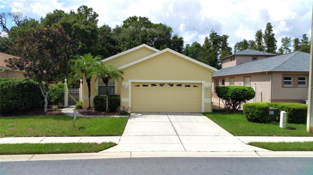 Photo of 8137 Ponkan Road, Land O Lakes, FL 34637 (MLS # TB8483656)