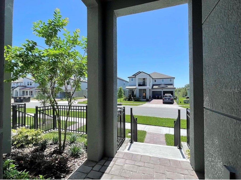 Photo of 7349 Alpine Butterfly Lane, Orlando, FL 32819 (MLS # O6439254)