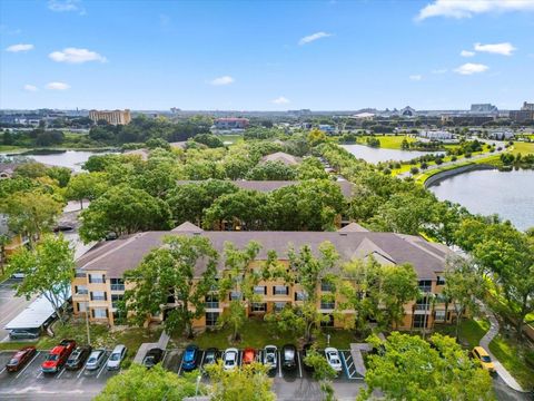 Photo of 7606 Pissarro Drive #104, Orlando, FL 32819 (MLS # O6398356)