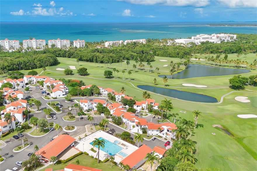 Mediterranean-inspired villa perfectly positioned within the lush grounds of the Wyndham Río Mar Resort, a hidden gem on the northern coastline famous for its scenic location and idyllic isolation.  

This villa offers privacy and serenity with a true Caribbean feel. Plentiful windows throughout, natural light seamlessly radiates throughout the home, easterly trade winds flow year-round providing a constant cool breeze, even in summer. An oversized balcony-terrace showcases refreshing views of the whitewashed, terracotta roofed villas and immaculately manicured grounds.  

Fully furnished & air conditioned, and outfitted in simple, beach-style décor, with two full sized futons to accommodate extra guests in the living area. Spacious galley kitchen is fully equipped with all gadgets and appliances, with dish and glassware for six. The master bedroom includes a queen sized bed, plenty of closet space, and a beautiful blue & white Spanish-style tiled bathroom. Additional private guest bedroom accommodates a full sized futon/bed.  

Especially convenient for families, the villa is located adjacent to the condominium’s private amenities; the clubhouse, swimming pool, kiddie pool, grilling gazebo and kiddie playground. The property is peaceful and quiet, yet the hotel and country club attractions are minutes away, providing a safe and discreet place that soothes the soul and allows one to forget about the cares of the world. The 500-acre grounds of the community include two golf courses with river and ocean vistas, the largest tennis facility in the Caribbean, Beach Club exclusive for villa residents, endless groves of palm trees and a mile-long expanse of pristine golden-sand beach… a true Caribbean oasis.