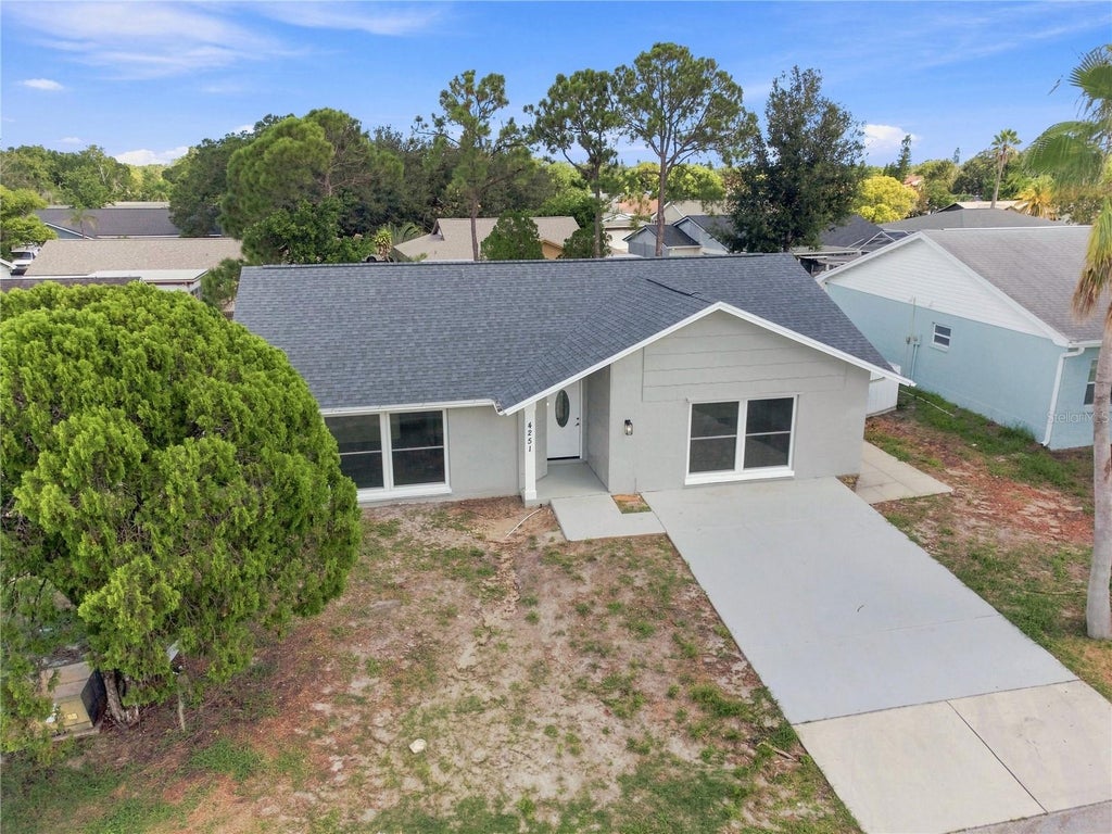 Photo of 4251 Woodfield Avenue, Holiday, FL 34691 (MLS # TB8545580)