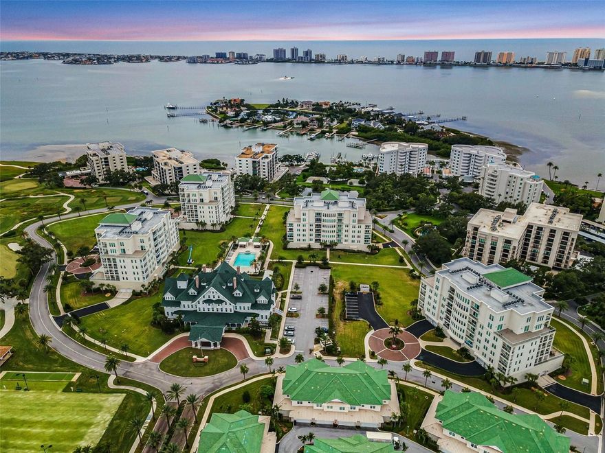 Experience Elevated Living in Carriage Homes at Belleview Place! This stunning 3-bedroom, 3-bath townhome offers luxury living in a prime location, nestled within the renowned Belleair Country Club and just minutes from the pristine Gulf beaches. Built in 2020, this home was constructed with the highest standards, this gated community provides comfort, security, and convenience with 24-hour security and a private in-unit elevator. Since it was built, there have been roughly $100k worth of updates done to truly make this a one-of-a-kind home! As you step inside, you're greeted by an abundance of natural light that highlights the spacious open-concept floor plan. Motorized blinds throughout the first and second floors allow effortless control of lighting and privacy. The main living area is anchored by a striking fireplace adorned with a mother-of-pearl backsplash, surrounded by an illuminated custom bookcase, also adorned with mother-of-pearl backsplash; a truly elegant focal point. In the living room, a stunning Murano lamp (included in purchase) from Murano, Italy adds a unique touch of European charm as well as a sense of uniqueness. The gourmet kitchen features custom cabinetry, sleek quartz countertops, SUB-ZERO, WOLF & COVE appliances, and a large walk-in pantry. The adjacent private wine room, which can also serve as an additional oversized primary suite, features a large Cedar closet, perfect for special items and fur coats. This room offers a serene retreat with earthy tones perfect for unwinding or entertaining. Upstairs, the primary suite includes a luxurious en-suite bath with a large linen closet, rainfall glass shower doors with water-repellent treatments, and rainfall shower head; exactly what can be throughout all of the en-suite bathrooms. The walk-in closet has a Cedar Closet built in as well; adding additional convenience when it comes to storing special items. Step out onto your private balcony, just outside of the primary bedroom. Here you will catch some of the most breathtaking sunsets Florida has to offer. Additionally, just off of the upper landing you'll find a cozy den offering another versatile space to relax or work. The air handler on the second floor, upgraded just 4 years ago, is equipped with a dehumidifier and air scrubbers (added 3 years ago) for enhanced indoor air quality and comfort. Additional highlights include: Motorized blinds throughout both floors, Mother-of-pearl accents on the elevator panels, Large 2-car garage in the rear with tankless water heater, water softener, and a small patio perfect for grilling, Laundry room on the first floor with custom cabinetry, granite countertops, and a Kohler farmhouse sink. 
No flood zone and no flood insurance required, as this property is situated on one of the highest points in Pinellas County. You’ll also enjoy access to golf, tennis, and marina amenities, making this a truly rare opportunity to own a slice of Belleair’s finest lifestyle. Schedule your private showing today and experience the perfect blend of elegance, comfort, and convenience. Furnishings negotiable.