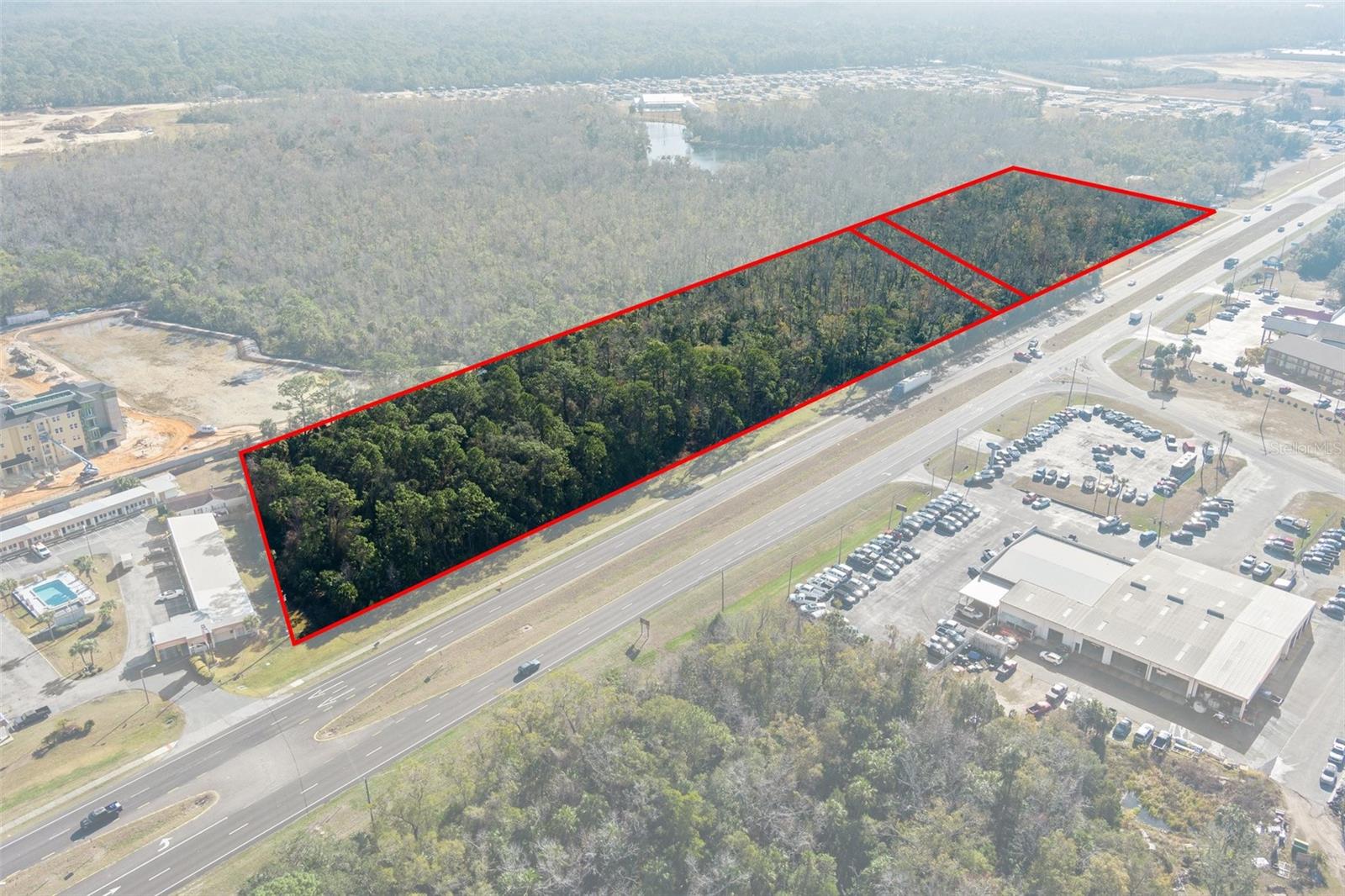 Bring your shovel and vision to this prime 11.51-acre commercial property in the heart of Florida’s Nature Coast, located in the City of Crystal River, Citrus County. With 1,730+ feet of frontage along US Highway 19—a major thoroughfare with 27,500 AADT—this property offers exceptional visibility and accessibility for businesses looking to capitalize on the area's growth.
Zoned CH (High Intensity Commercial), this versatile property is ideal for a wide range of commercial developments, including large-scale businesses, retail stores, quick-service and dine-in restaurants, hotels, professional and medical offices, self-storage facilities, gas stations, convenience stores, drugstores, warehouses, terminals, and shopping centers. Its strategic location provides an excellent opportunity for businesses seeking high traffic exposure and access to a rapidly expanding customer base.
Positioned just north of Crystal River’s Historic Downtown, the site is surrounded by trendy shops, local vendors, charming restaurants, and entertainment venues. The area is experiencing rapid economic growth, with significant new developments already underway. Among them, the former Crystal River Mall is being transformed into a 400-unit residential apartment community with mixed-use retail, bringing an influx of new residents and potential customers. Additionally, directly adjacent to the rear boundary of the property, Hidden Lake RV Resort—an 85-acre development with 580 RV lots—is under construction, further increasing demand for commercial services in the area.
Disclaimer: All information provided herein is for marketing purposes only and is not guaranteed for accuracy. Prospective buyers or tenants are encouraged to conduct their own independent due diligence. The seller, broker, and associated parties make no representations or warranties, expressed or implied, as to the accuracy or completeness of this information. All dimensions, zoning details, financial data, and other property-related facts should be independently verified. Please consult with appropriate licensed professionals before making any investment or purchasing decisions.
