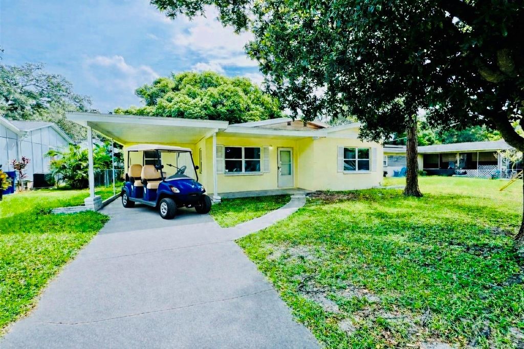 Photo of 1247 Davis Road, Dunedin, FL 34698 (MLS # TB8488776)