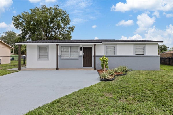 8303 BAHIA AVE, TAMPA, FL 33619 - Image 9b2843cc452df7fbcd83901c842bfe9a/1678619223