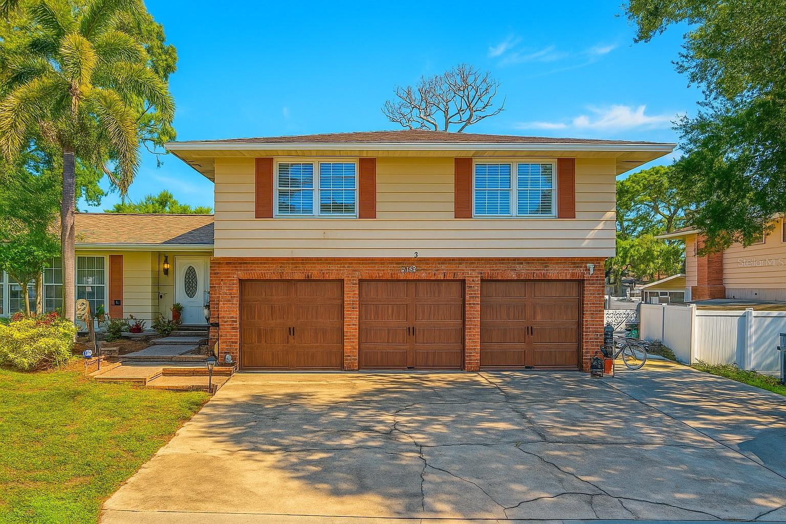 One or more photo(s) has been virtually staged. Charming Tri-Level Pool Home in Seminole – Minutes from the Beach!
A spacious 5-bedroom, 3-bathroom Avanzini-built home located in a quiet, sought-after Seminole neighborhood—just minutes from Florida’s beautiful Gulf beaches and
top-rated schools.
This tri-level layout offers a family room with fireplace, an updated kitchen with wood cabinets and granite countertops, and a lower-level living area that opens to a covered
patio and screen-enclosed pool. The large fenced yard, 3-car garage, and RV/boat parking make it ideal for active families. With an all-new roof, hurricane shutters.
No flood insurance required, this home offers both value and potential. A little TLC will make this property shine—perfect for families or investors seeking a fantastic fix-and-flip opportunity.