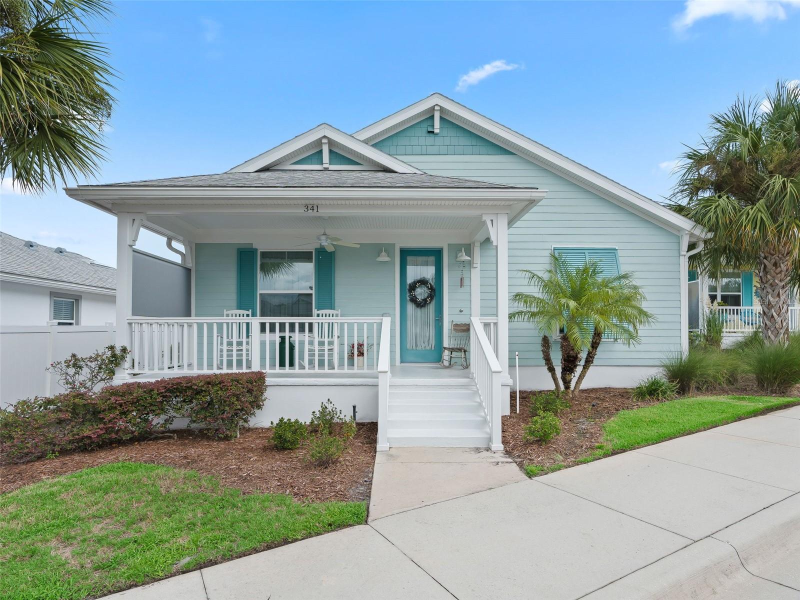 Key West Style Homes Only! This one is a show stopper! As soon as you step in, you'll notice the crisp, clean space. Elevated ceilings and 8 ft doors give this a luxury feel. Beautiful kitchen with 42 inch upper cabinets, Quartz counters and a large island. Upscale features include crown molding throughout the entire home and beautiful tongue and groove on ceiling in living room. Master bathroom has over sized walk in shower and is handicap accessible. Solar panels afford this owner a typical electric bill less than $40/month. The 2 car garage is on the backside of the home keeping the front view lovely and clean. This community is for the social butterfly. Get ready for regular lunches, pickleball, tennis, basketball and of course a great pool where you'll meet your new best friends. Green Key Village is a 55+ community and one of the neatest places with some of the coolest houses. You'll think you are right in Key West! The Villages are close by offering tons more amenities.