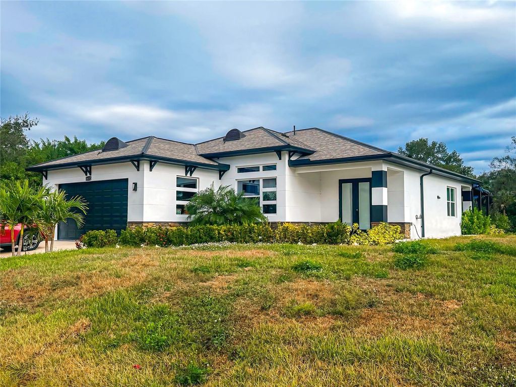 Photo of 1432 Nabatoff Street, North Port, FL 34288 (MLS # A4691140)